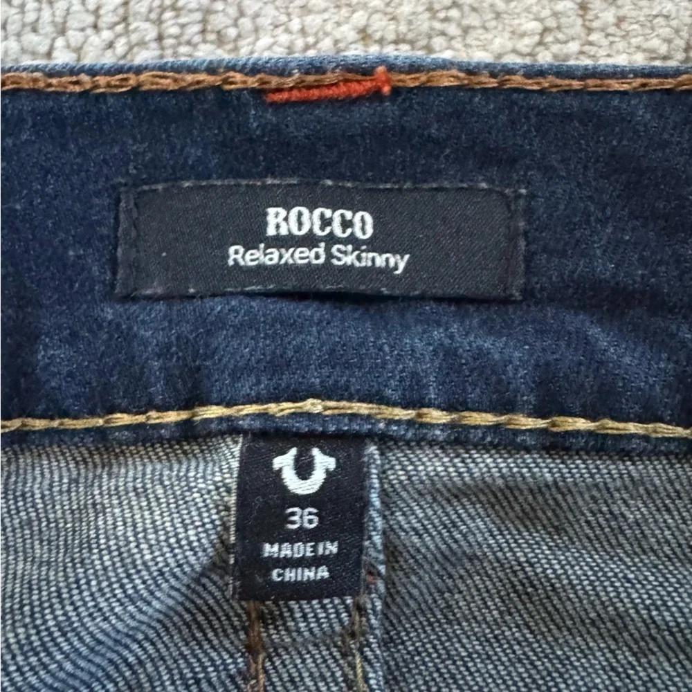 True Religion jeans Rocco relaxed skinny jeans dark wash flap pockets 36